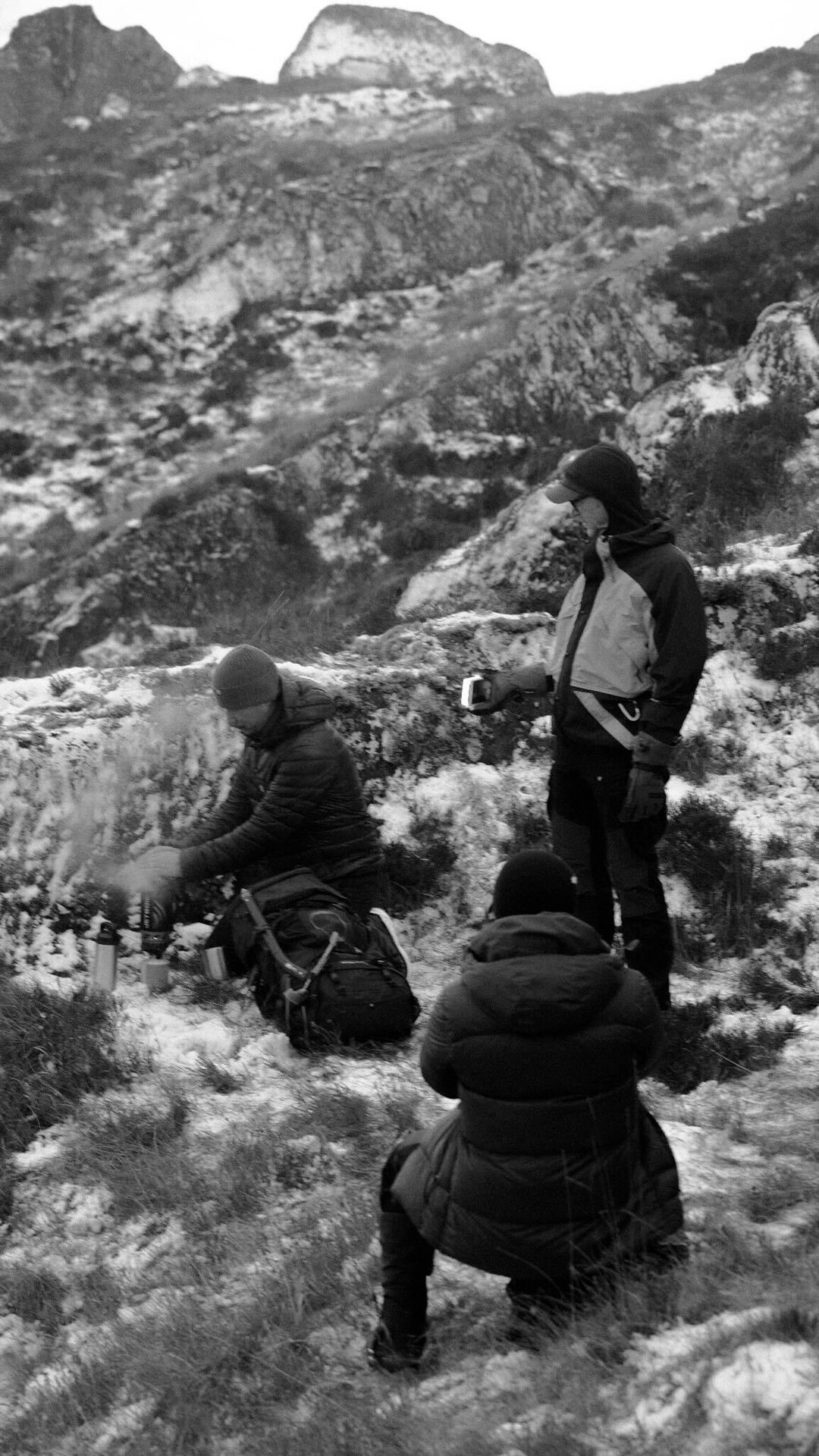 The Studio Graft team sitting on a Scottish mountainside