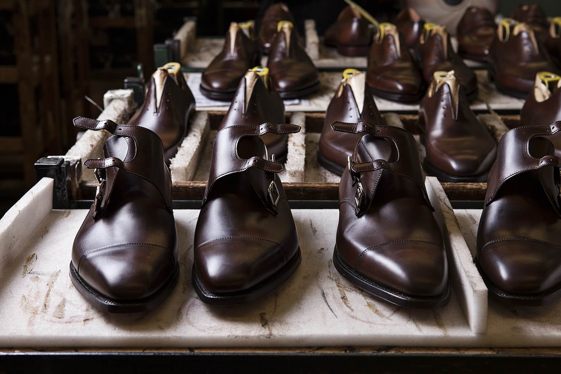 Rows of leather shoes being made