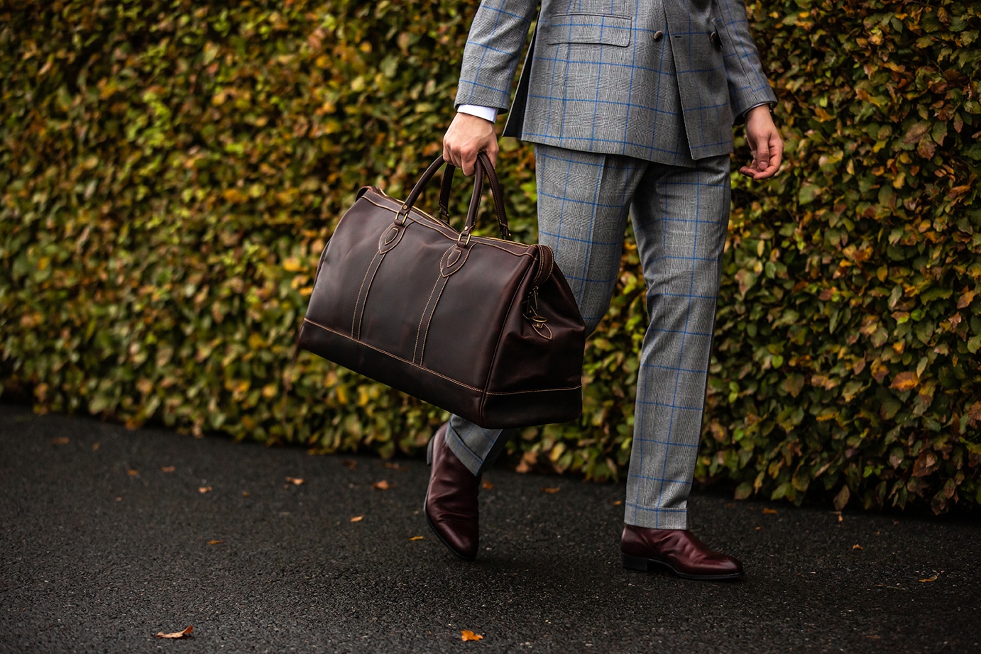 Edward Green Lambourne boots with a suit and leather holdall