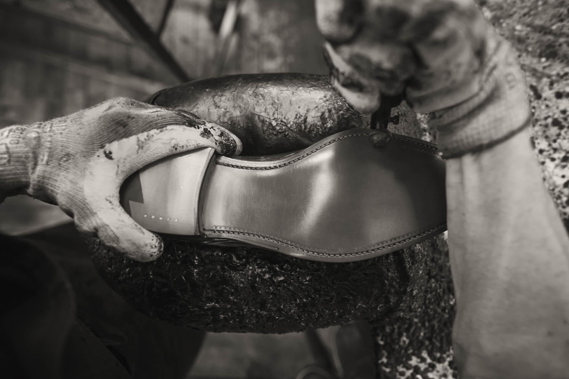 Sole of a leather shoe being worked on