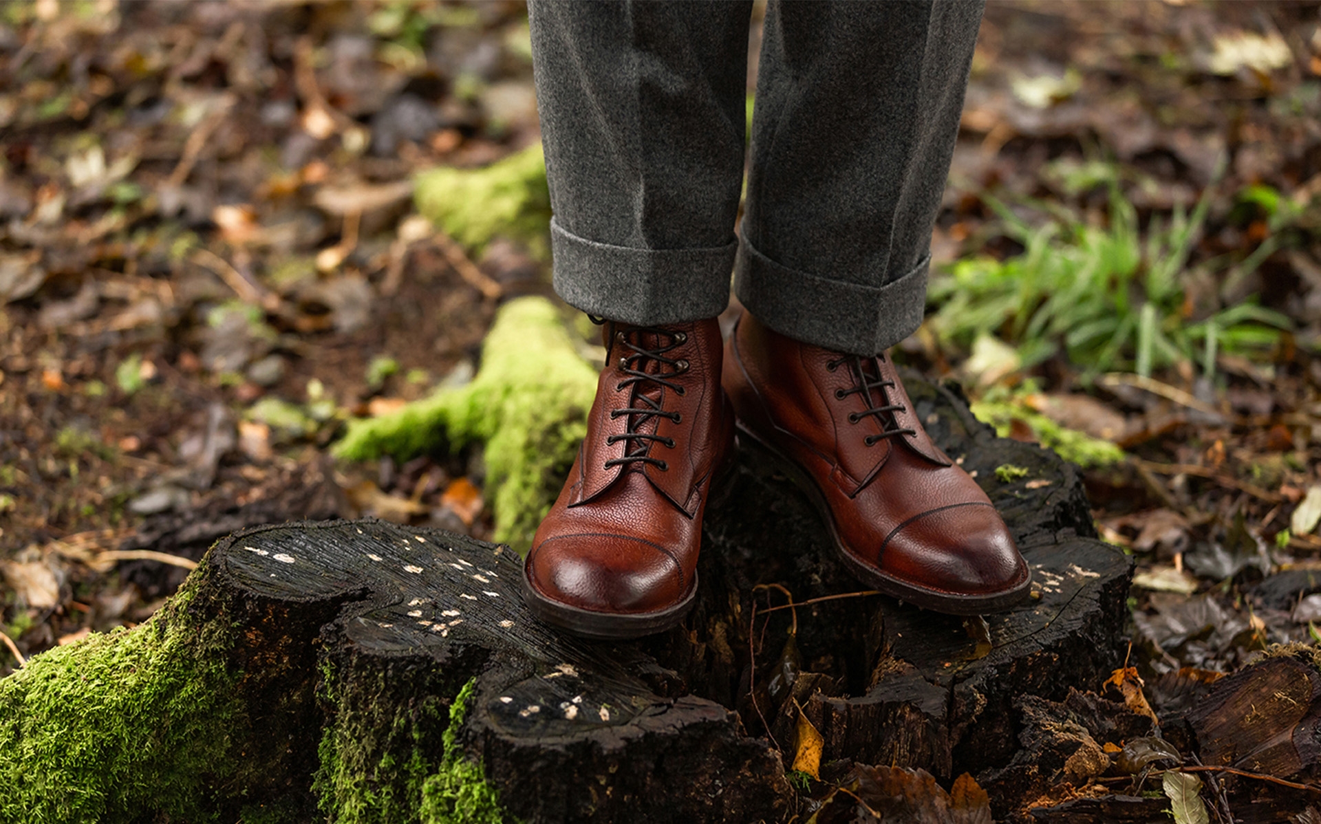 Edward Green Galway boots on a tree trunk