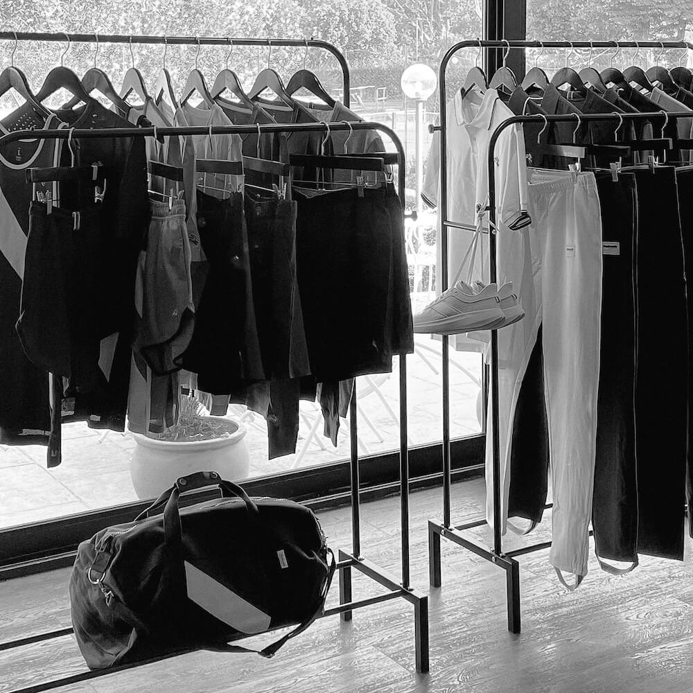 Black and white photo of clothes on display at Pitti Uomo