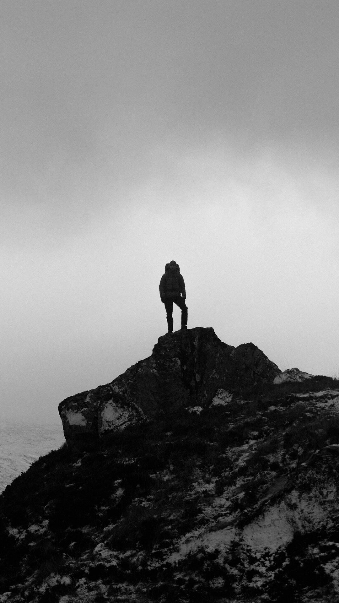 Luke Martin standing on a mountain